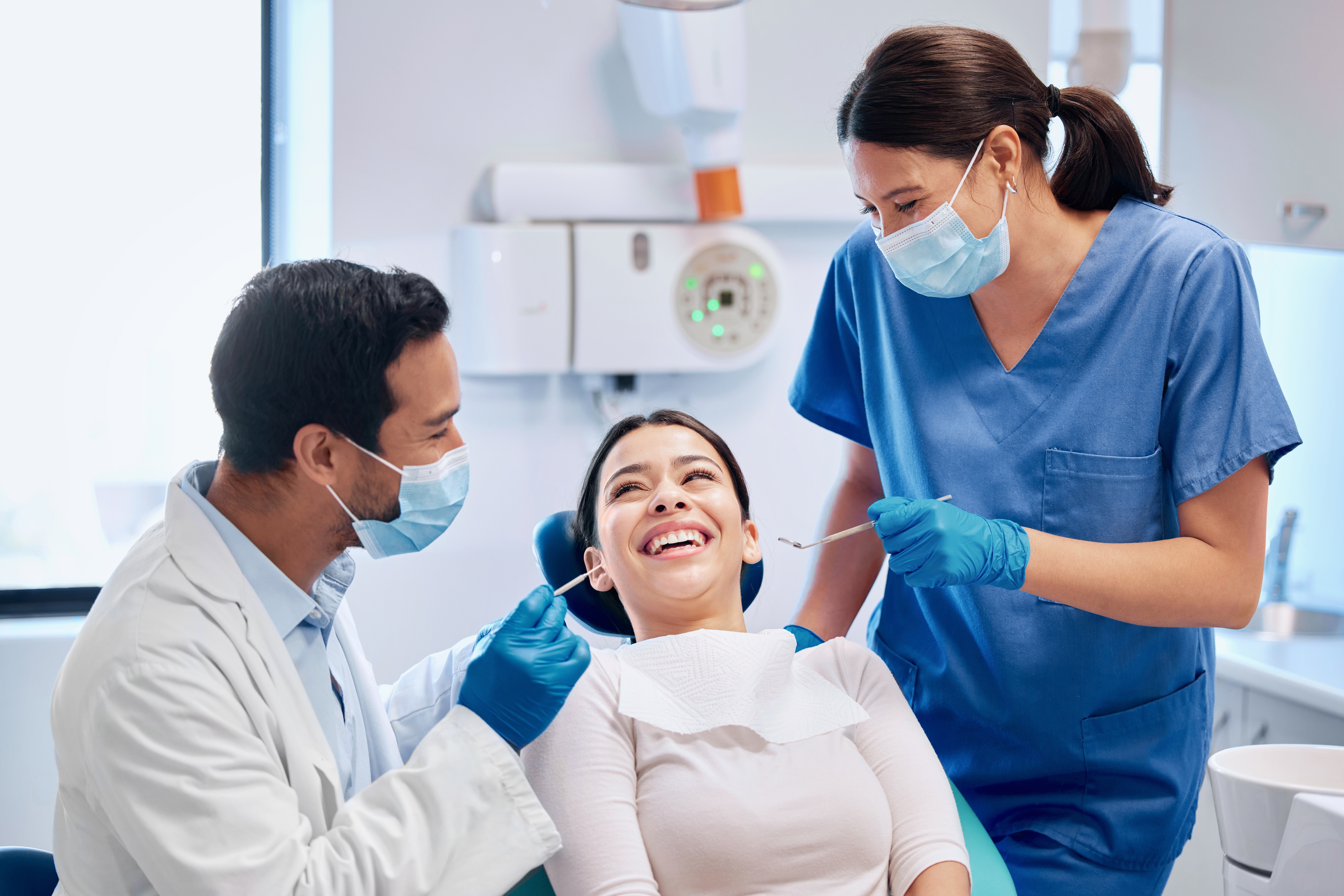 Woman at a dental consultation with doctor and dentist in clinic — dentist near me Palmdale