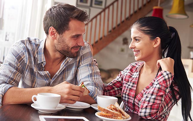 A man and woman enjoying lunch after a regular visit with their Palmdale CA dentist 